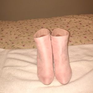 Pink suede boots.